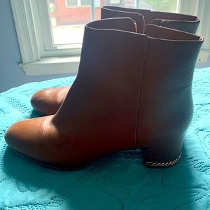 Beautiful Michael kors booties with gold chain on heel